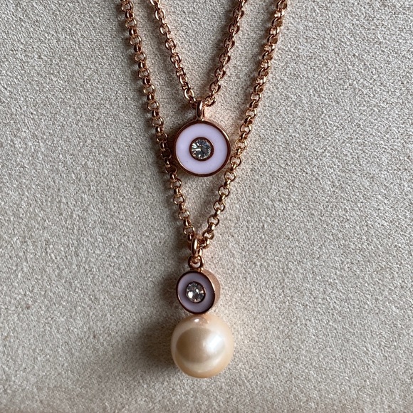 Kate Spade rose gold necklace with faux pearl.